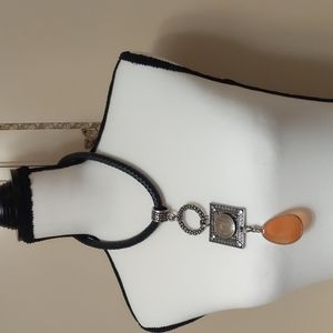 Necklace with amber and green stones